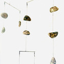 <i>Worry beads mobile</i>  2023. Bronze, aluminium, steel cable, steel rods, fishing tackle