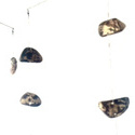 <i>Worry beads mobile</i>  2023. Bronze, aluminium, steel cable, steel rods, fishing tackle
